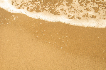 background texture sea wave on sand