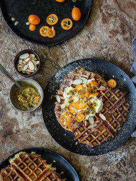 Buttermilk waffles with yogurt, passion fruit and kumquat