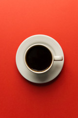 Obraz na płótnie Canvas Turkish coffee, white cup and white plate on vivid background