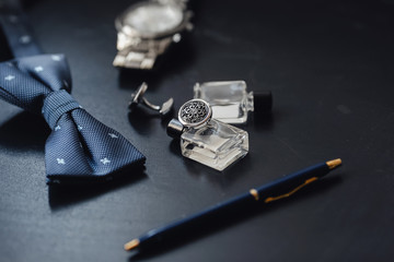 luxury men's cufflinks with watch, pen and parfums bottle