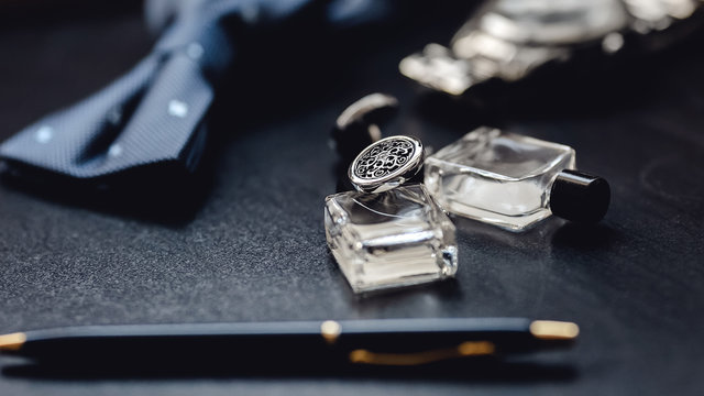 luxury men's cufflinks with watch, pen and parfums bottle