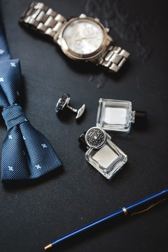 luxury men's cufflinks with watch, pen and parfums bottle