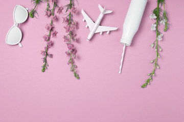 Summer subject photography. A white plane on a pink background