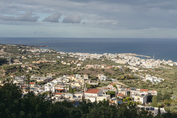 Obraz premium Panoramic, picturesque view of the city resort Hersonissos (Greece, island Crete)