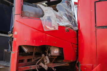 Bus collision crush traffic accident broken wrecked buses with smashed windshield shredded glass ready for scrap junk