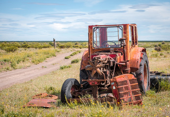 Fototapeta premium old tractor in field