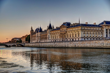 Obraz na płótnie Canvas Buildings and bridges along the Seine River in Paris