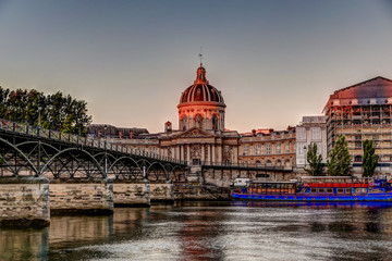 Fototapeta na wymiar Buildings and bridges along the Seine River in Paris