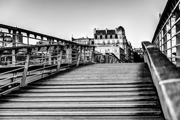 Obraz premium Architectural details and padlocks of a footbridge in Paris France