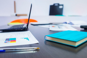 Financial reports and charts on a office table