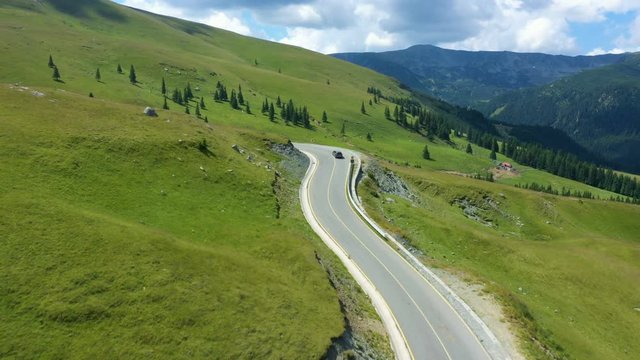 aerial view of famous romanian mountain road Transalpina at the sunny summer day