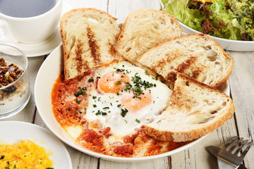 Sunny side up eggs with crsipy toast on the plate   