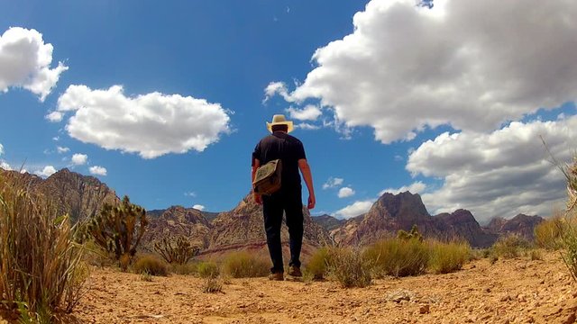  Low Angle Man Hiking In Desert At Red Rock Canyon- Nevada