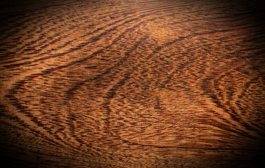 Hard brown wood texture closeup macro with heavy vignetting