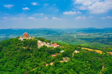 Fototapeta na wymiar Aerial view of Wat Pa Phu Hai Long located on top of the mountain in Nakhon Ratchasima Province, Thailand