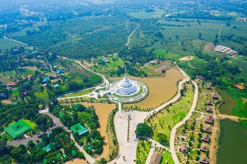 Aerial view of white pagoda at Wat Sangtham wangkaokaew at Wangnamkaew ,Nakornratchasrima,Thailand