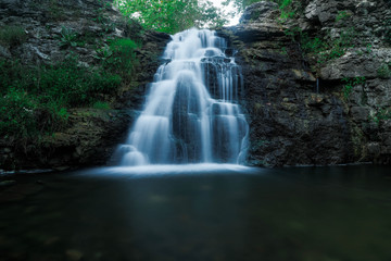 Fototapeta premium Water fall at old stone quarry near Logansport Indiana 