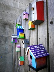 Colorful bird feeder houses in Steveston, a town located in the city of Richmond, British Columbia, Canada.