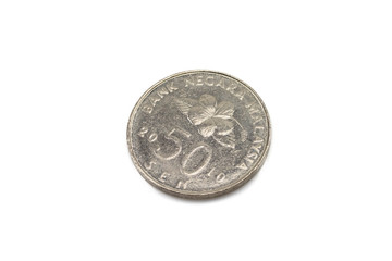 A super close up image of a fifty sen coin from Malaysia, shot in macro, isolated on a clean, white background © Peter