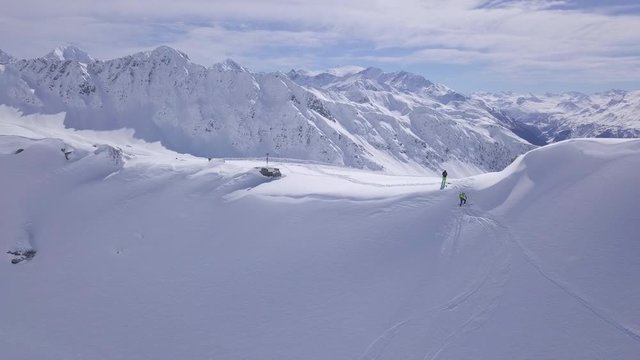 A skier start a freeride down from, La Rosiere, Espace San Bernardo, France