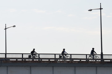 Three bicycles on Theodore Roosevelt Bridge in a foggy winter day - Washington D.C. United States...