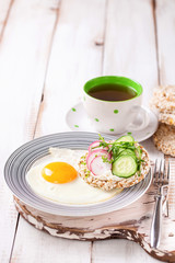 Toast with cheese, a cucumber and a garden radish