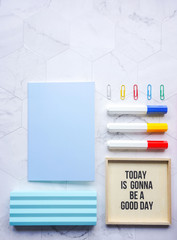 Pastel color office supplies and school stationery on white background. Back to school concept. Flat lay objects on marble pattern, 