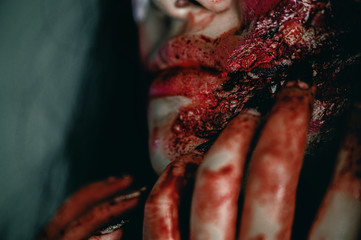 Close-up zombie women with resentment in an abandoned building, Halloween murder concept.