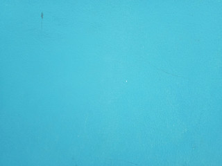 Smooth surface blue cement wall background