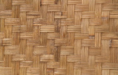 Closeup of vintage handmade  bamboo wall of cottage. A natural background and backdrop. 