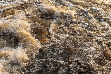 Background texture waves turbid water flowing.