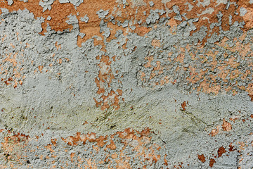 Texture of a concrete wall with cracks and scratches which can be used as a background