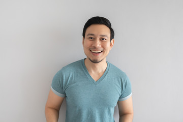 Happy man with clear and innocent smile face.