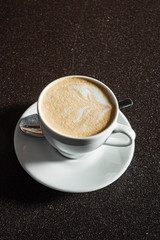 cappuccino  on the black background