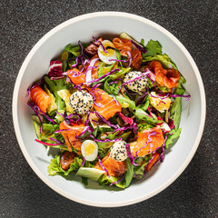 salad with salmon and quail eggs