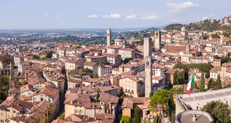 Obraz premium Bergamo, Italy. Amazing drone aerial view of the old town. Landscape at the city center, Its historical buildings and the towers