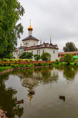 Church of St. Nicholas the Wonderworker and garden pond in Tolga convent in Yaroslavl, Russia