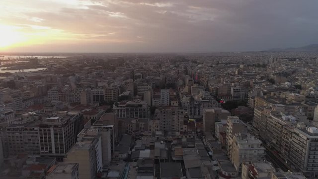 Aerial view of Thessaloniki city, Greece. Sunset. 4K