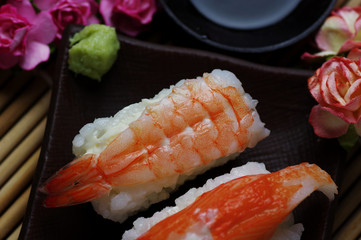 The seafood sushi serving with soy sauce and wasabi
