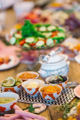 Brushettas, Cheese Varieties, Mediterranean Olives, Pickles, Bowl of Prosciutto di Parma and jams