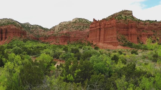 Lush Valley And Red Canyon Walls- Caprock Canyon State Park