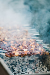 Obraz na płótnie Canvas barbecued shish kebab. Preparation of shish kebab bbq. Grilled meat shish kebab
