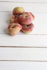 Paraguayan peach on wooden background