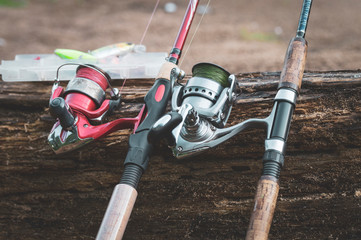 Spinning and tree background, fishing, selective focusing