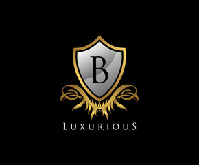 Classy Shield B Letter Logo. Gold Vintage Shield With B Letter prefect for boutique, hotel, restaurant, wedding and other elegant business. 