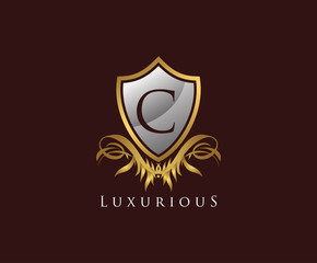 Classy Shield C Letter Logo. Gold Vintage Shield With C Letter prefect for boutique, hotel, restaurant, wedding and other elegant business. 