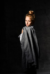 Fashion shooting in studio . Professional model , fashionable clothes and style, new collection. stylish look.