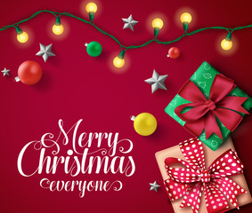 Fototapeta na wymiar Christmas vector banner template. Merry christmas everyone typography text in empty space with colorful xmas decor elements of gifts, balls, lights and silver stars in red background.