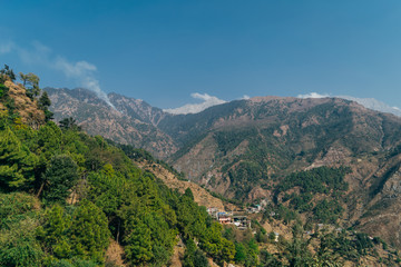 Fototapeta na wymiar Himalayan mountain landscape and view of Dharamshala valley in Himachal Pradesh, India