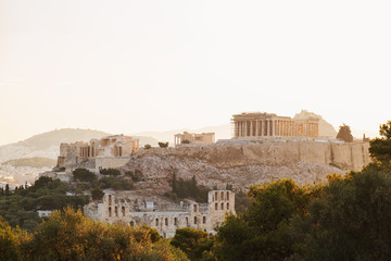 City of Athens, Greece, Parthenon, on main symbol of ancient Greece, Acropolis aerial view drone on panorama of residential buildings sunrise. The lights sun. World Heritage sites. Travel. Tourism